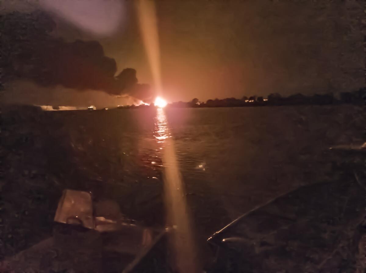 Fireball on the horizon on the Ukrainian shore of the Danube River