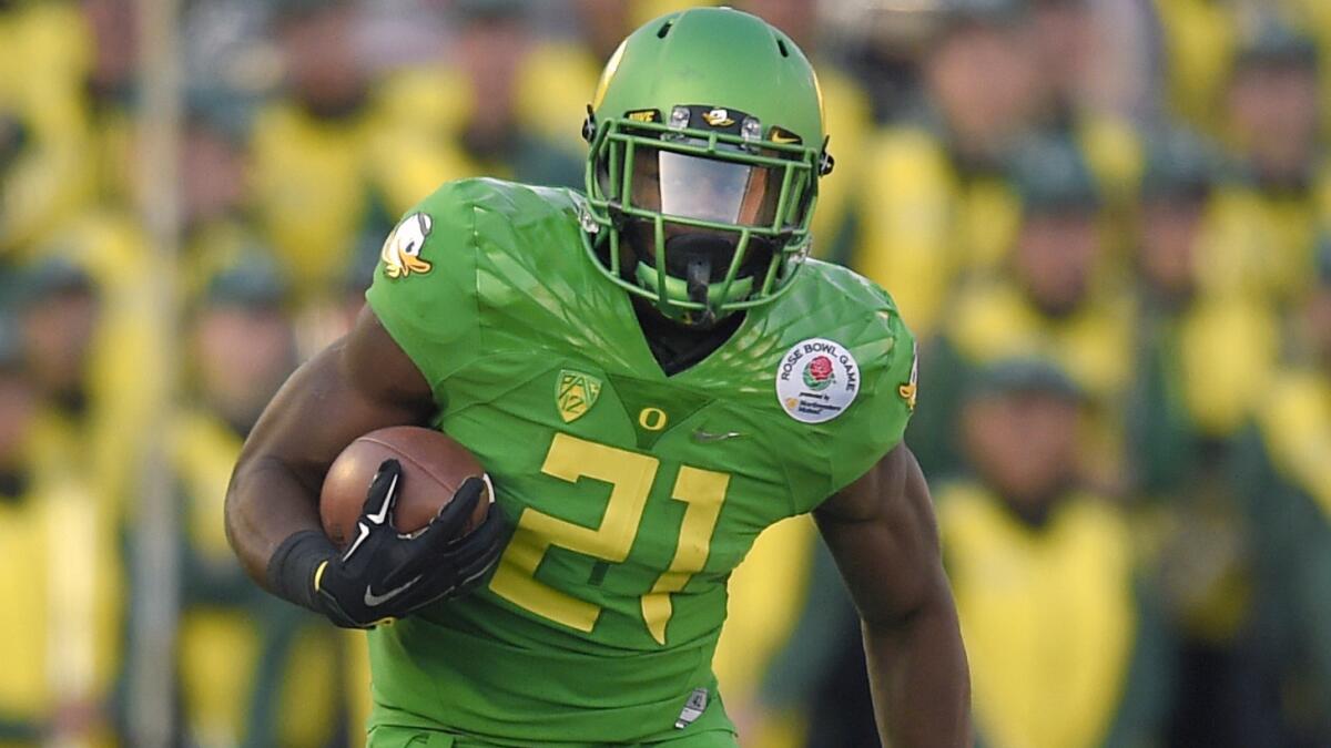Oregon running back Royce Freeman carries the ball during the Ducks' win over Florida State in the College Football Playoff semifinal at the Rose Bowl on Jan. 1. Freeman is one of several Oregon players who hail from Southern California.