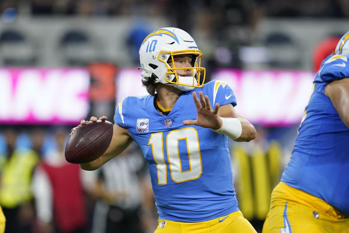 Chargers quarterback Justin Herbert throws against the Las Vegas Raiders on Oct. 4.