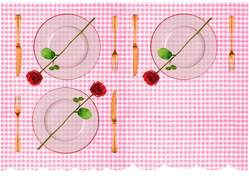 Place settings for three people with a rose atop each plate.