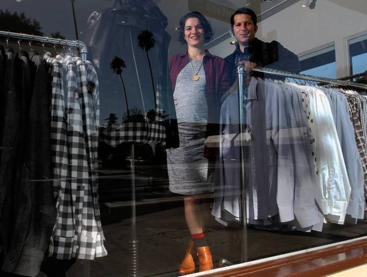 Married partners Adele Berne and Michael Kuhle at their menswear store Epaulet on Montana Avenue in Santa Monica.