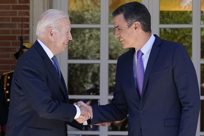 President Joe Biden and Spain's Prime Minister Pedro Sánchez shake hands as they meet at the Palace of Moncloa in Madrid, Tuesday, June 28, 2022, to discuss continuing efforts to support Ukraine. Biden will also be attending the North Atlantic Treaty Organization summit in Madrid. (AP Photo/Susan Walsh)