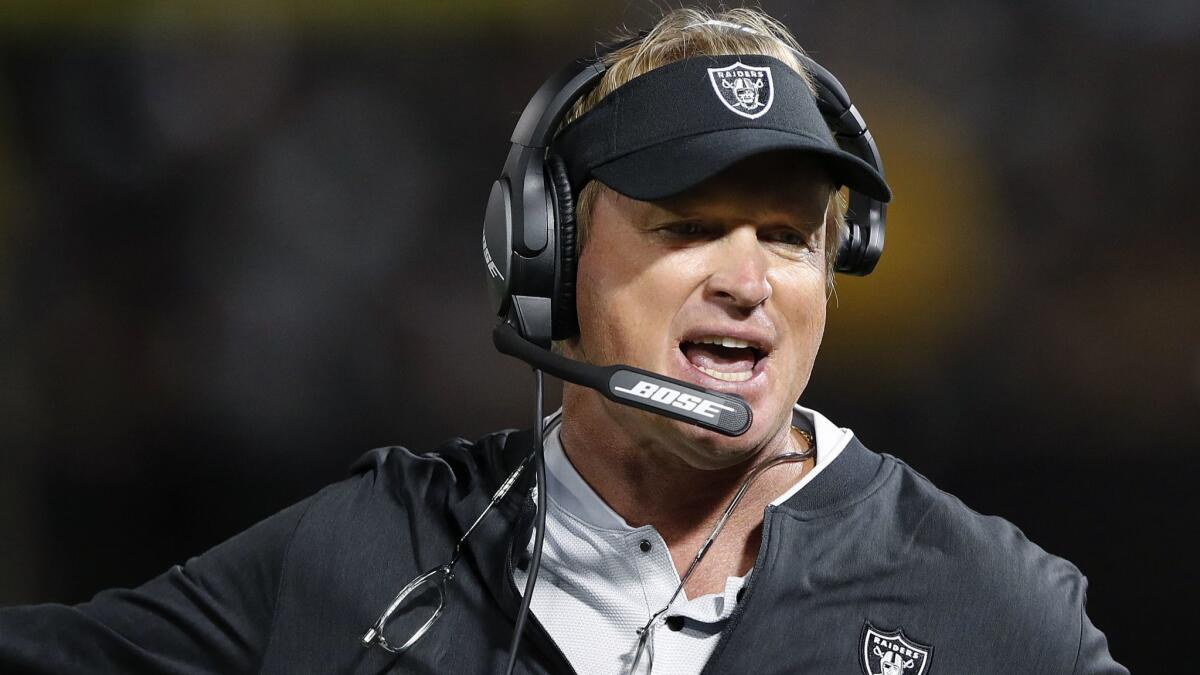 Raiders coach Jon Gruden reacts after a play during the first half of his team's game against the Lions on Friday night in Oakland.