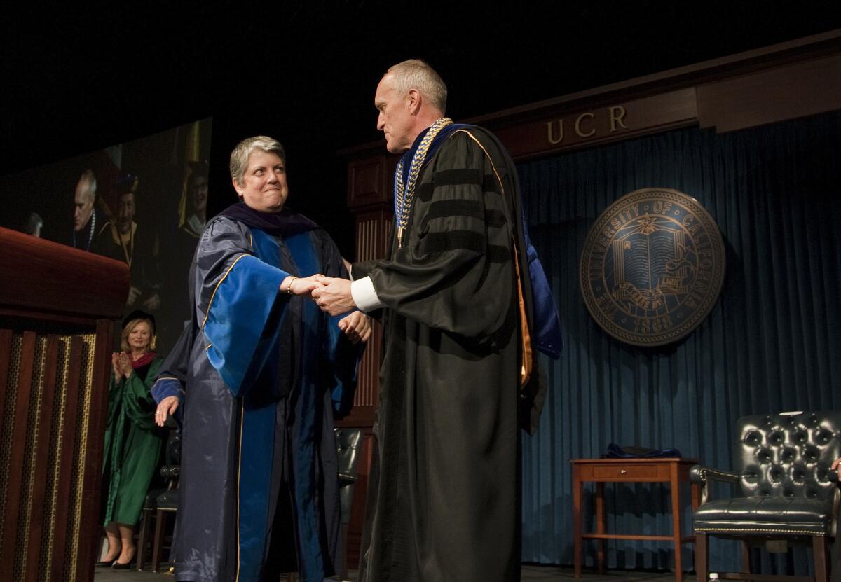 University of California President Janet Napolitano, left, congratulates new UC Riverside Chancellor Kim Wilcox at his investiture ceremony.