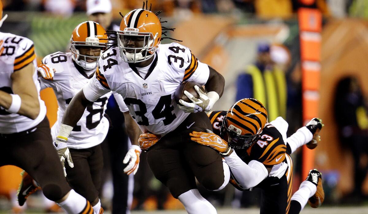 Bengals safety George Iloka tries to tackle Browns running back Isaiah Crowell in the second half Thursday night.