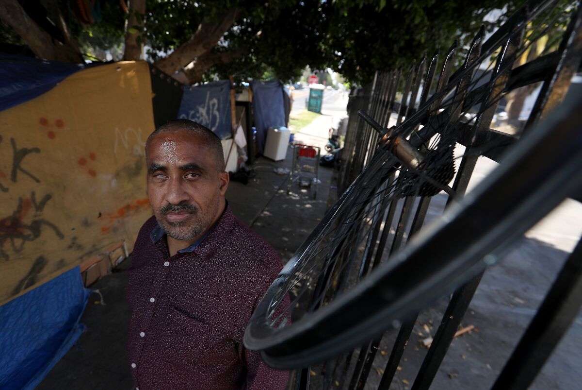 Shawn Pleasants visits the Koreatown encampment where he once lived.