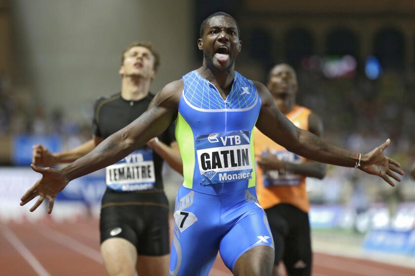 Justin Gatlin wins the men's 200-meter event at the Herculis International Athletics Meet in Monaco in July.