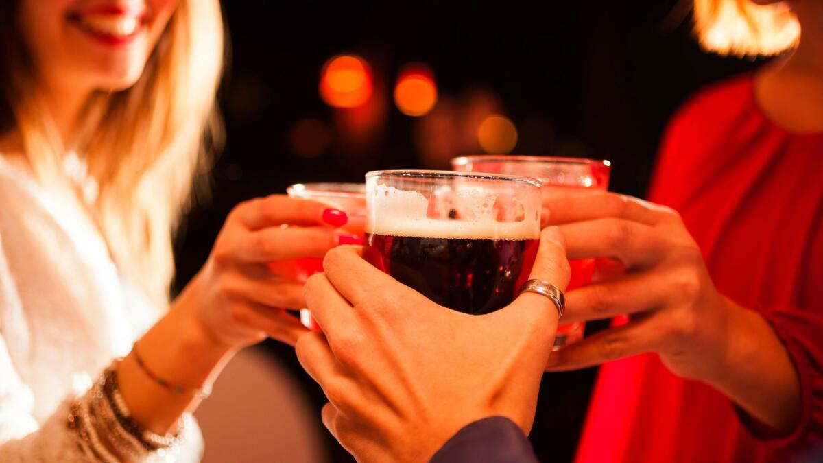 The American Cancer Society recommends men consume no more than two alcoholic drinks per day, and women only one.