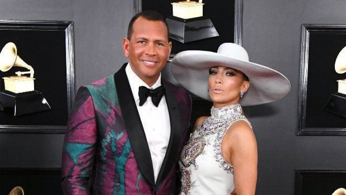 Alex Rodriguez has sold his home in the Hollywood Hills for $4.4 million. Above: At the Grammys in February with partner Jennifer Lopez.
