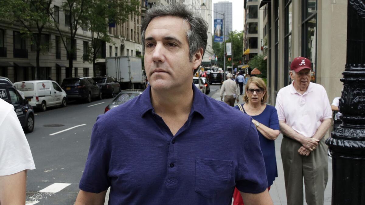 President Trump's former personal lawyer Michael Cohen, shown in July, has pleaded guilty to eight federal charges, including campaign finance fraud.