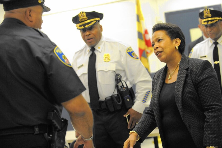 U.S. Atty. Gen. Loretta Lynch meets with Baltimore police officers this month.