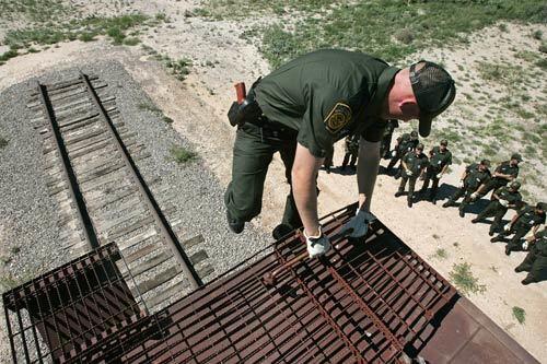 Students at the U.S. Border Patrol Academy in Artesia, N.M., get some hands-on training on a rail car. Train stops and searches for stowaways are a routine part of operations for agents along the border.