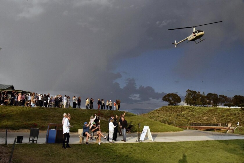 Guests watch as the helicopter approaches at the event in 2019.