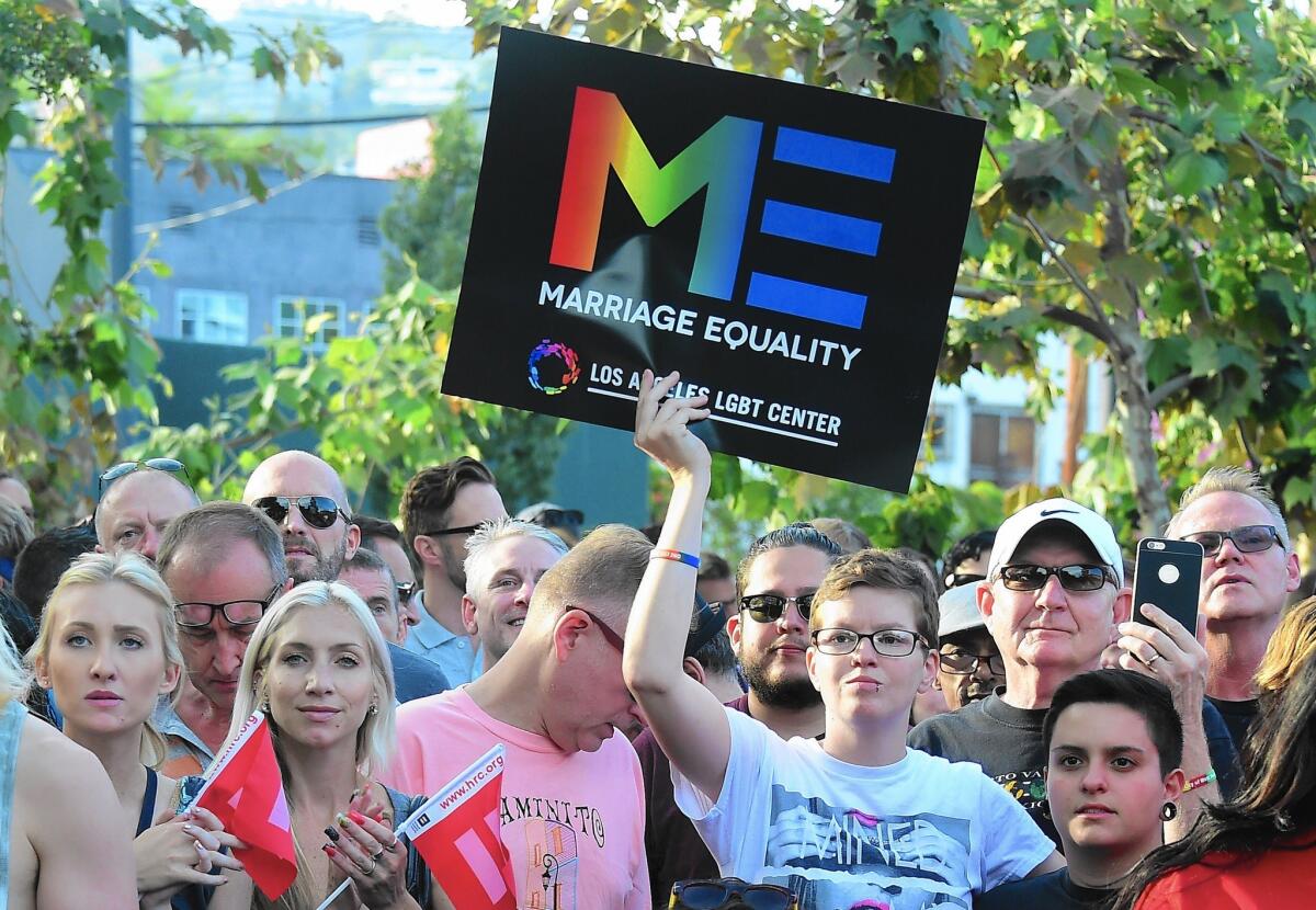 LGBT supporters gather for a rally in West Hollywood on June 26 to celebrate the U.S. Supreme Court decision clearing the way for same-sex marriages.
