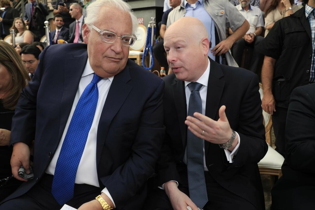 U.S. Ambassador to Israel David Friedman, left, and White House Mideast envoy Jason Greenblatt attend the opening of an ancient road at the City of David, a popular archaeological and tourist site in the Palestinian neighborhood of Silwan in East Jerusalem on June 30, 2019. Greenblatt will depart the administration in the coming weeks.