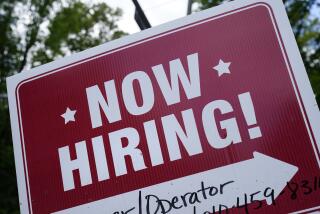 FILE - A "now hiring" sign is posted in Garnet Valley, Pa., Monday, May 10, 2021. Job openings stayed at a near-record level in February, 2022, little changed from the previous month, continuing a trend that Federal Reserve officials see as a driver of inflation. (AP Photo/Matt Rourke, File )