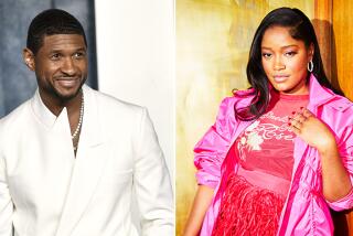 One picture of Usher in a white blazer and chain. Another picture of Keke Palmer in a hot pink blazer and dress