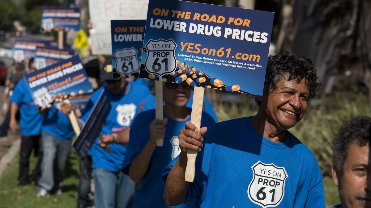 Supporters of the California drug-pricing initiative Proposition 61 demonstrate in September. The measure, which was opposed by drug companies, failed, but so might other proposals to limit drug profits.
