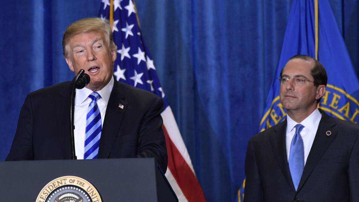 President Trump, left, with Health and Human Services Secretary Alex Azar, attends a discussion about drug prices. But are they plotting to undermine protections for preexisting conditions?