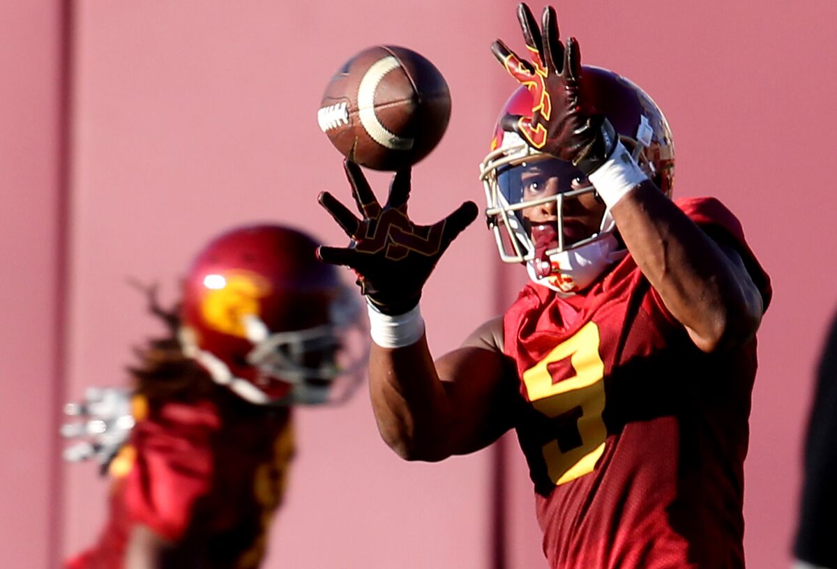 Juju Smith-Schuster makes a catch on the first day of spring training at USC's Howard Jones Field in 2016.