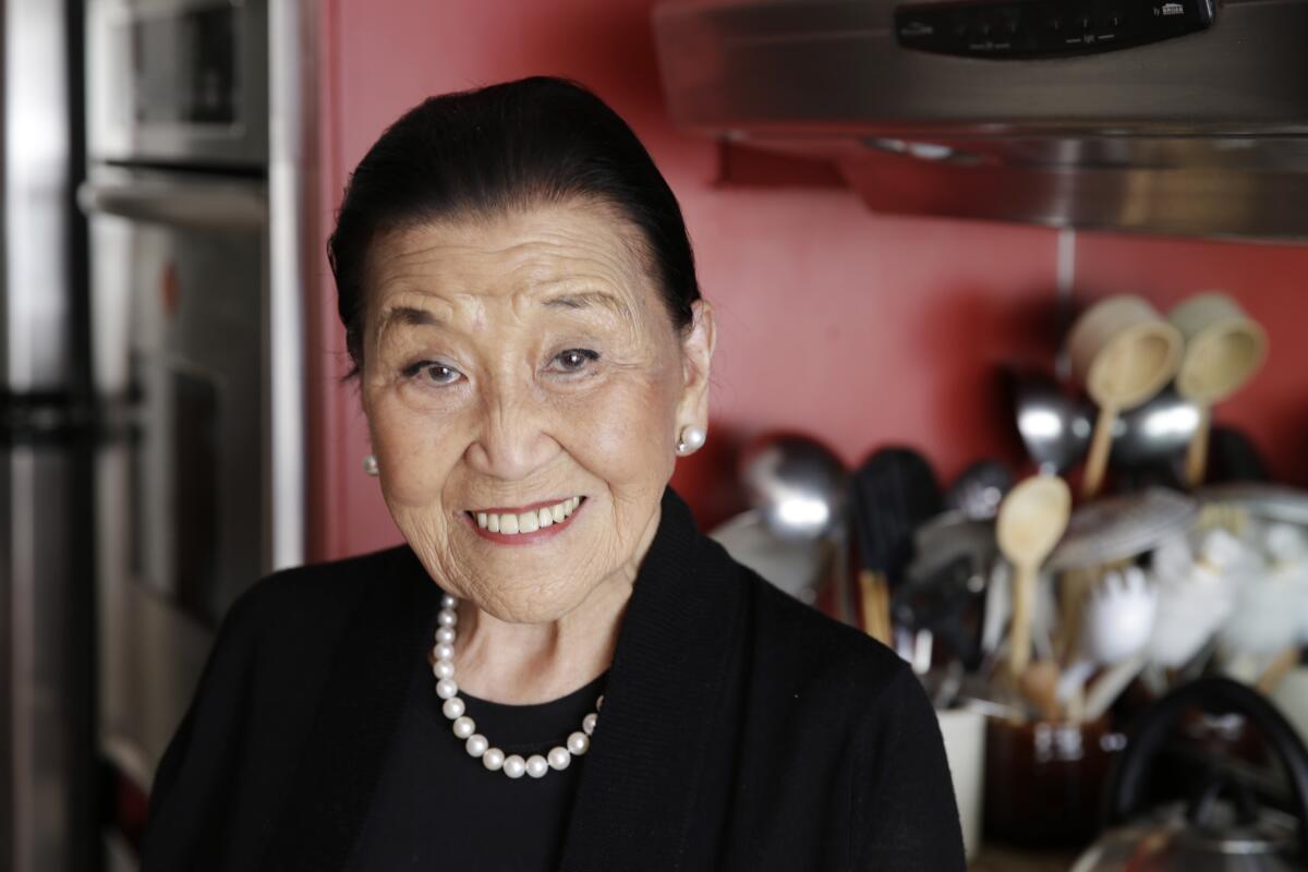 Cecilia Chiang poses in the kitchen of her home in San Francisco in 2014.