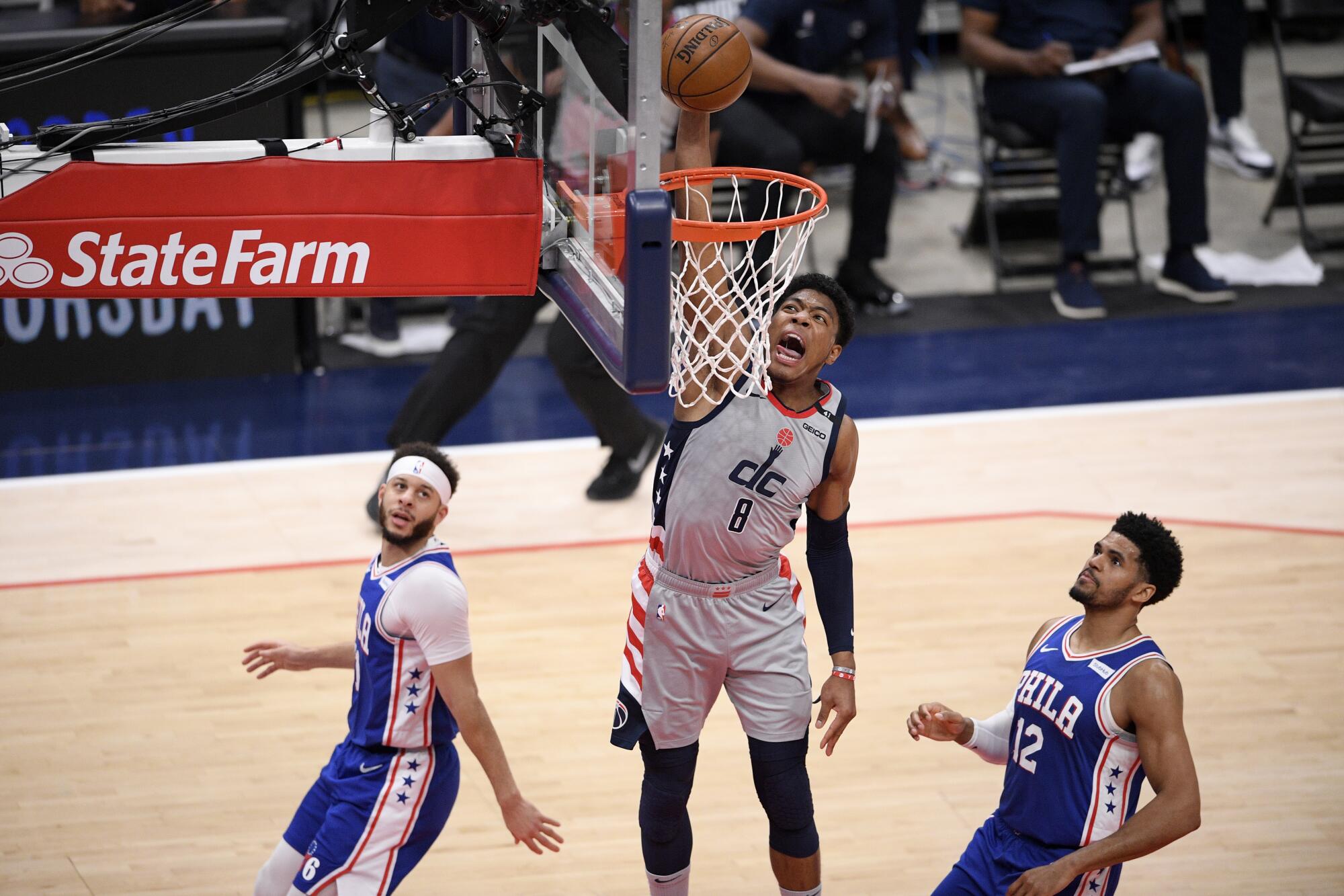 Washington Wizards forward Rui Hachimura (8) dunks during an NBA playoff series