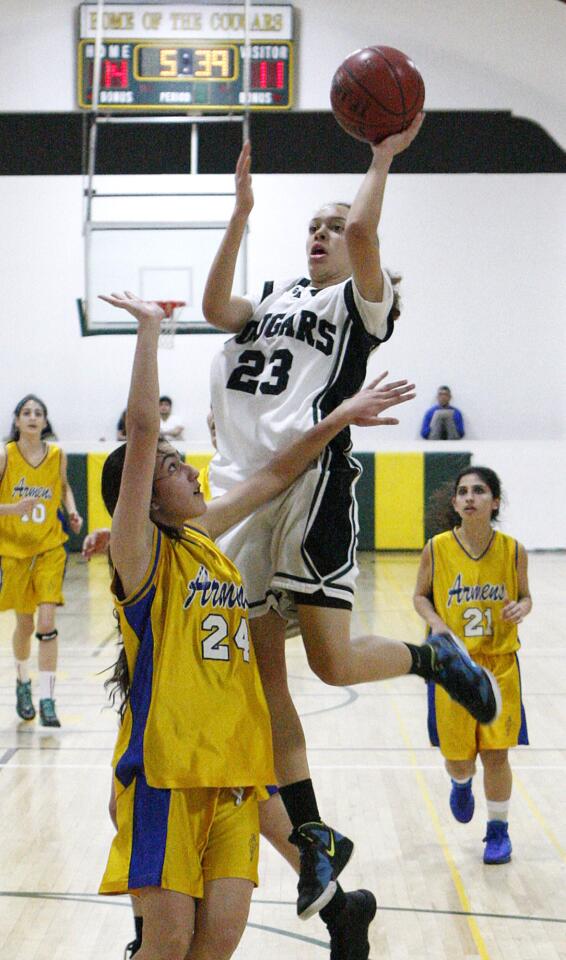 Photo Gallery: Glendale Adventist Academy vs. Holy Martyrs girls basketball