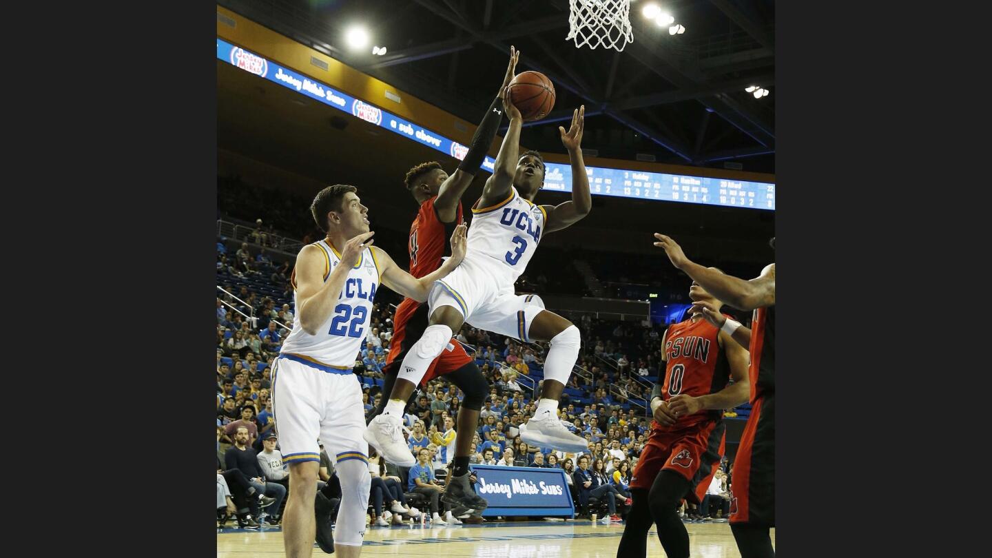 Aaron Holiday, Tavrion Dawson