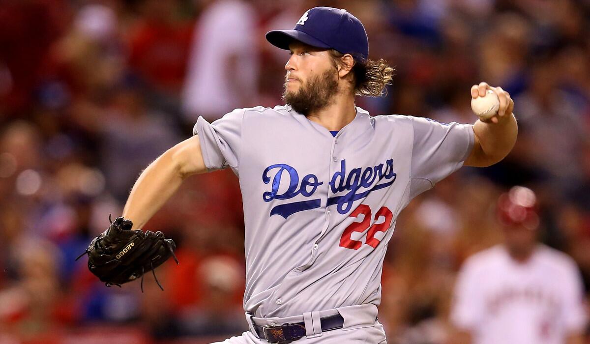 Dodgers pitcher Clayton Kershaw works against the Angels on Tuesday night at Angel Stadium.