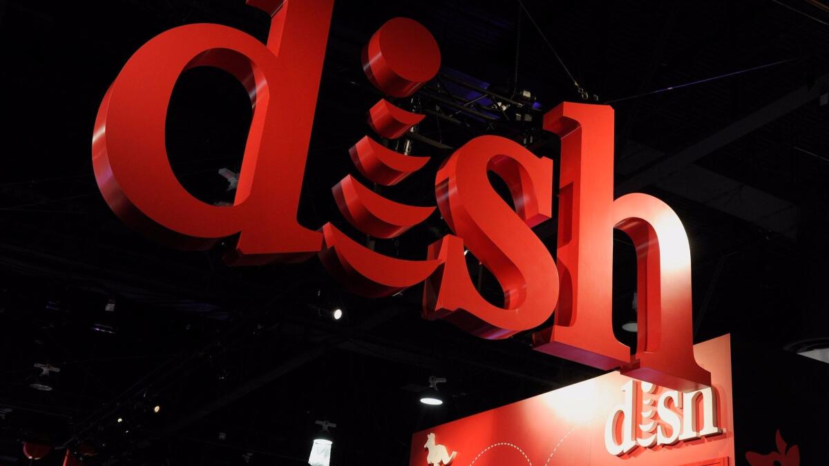 The Dish Network booth at the 2013 International Consumer Electronics Show in Las Vegas is shown.