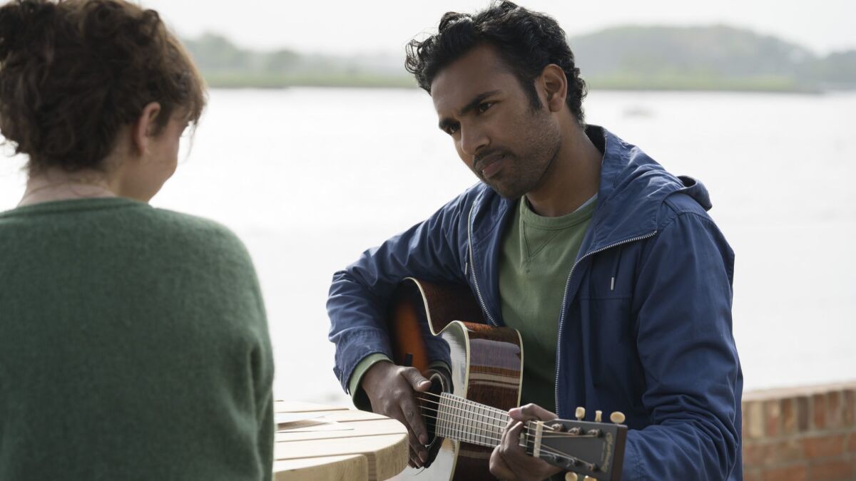 Jack Malik (Himesh Patel) and his devoted friend Ellie (Lily James) in "Yesterday," directed by Danny Boyle. Photo credit: Jonathan Prime/Universal Pictures