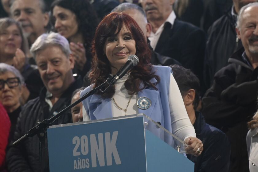 FILE - Argentina's Vice President Cristina Fernandez smiles during a rally to commemorate the 20th anniversary of her late husband President Nestor Kirchner's inauguration at Plaza de Mayo in Buenos Aires, Argentina, May 25, 2023. A judge in Argentina on Monday, June 5, 2023 dismissed a long-running money laundering case against Fernandez de Kirchner, after prosecutors and state agencies said there was no evidence she was involved in a crime. (AP Photo/Mario De Fina, File)