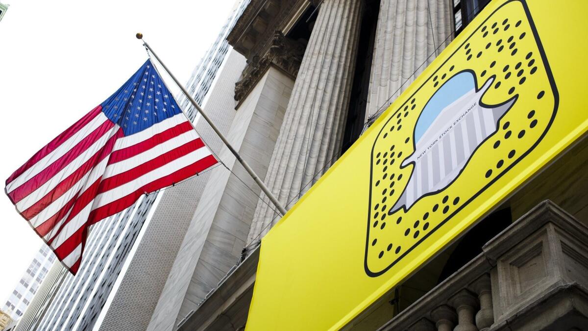 Snap said the Justice Department and the Securities and Exchange Commission are looking into allegations it misled investors ahead of its initial public offering last year.