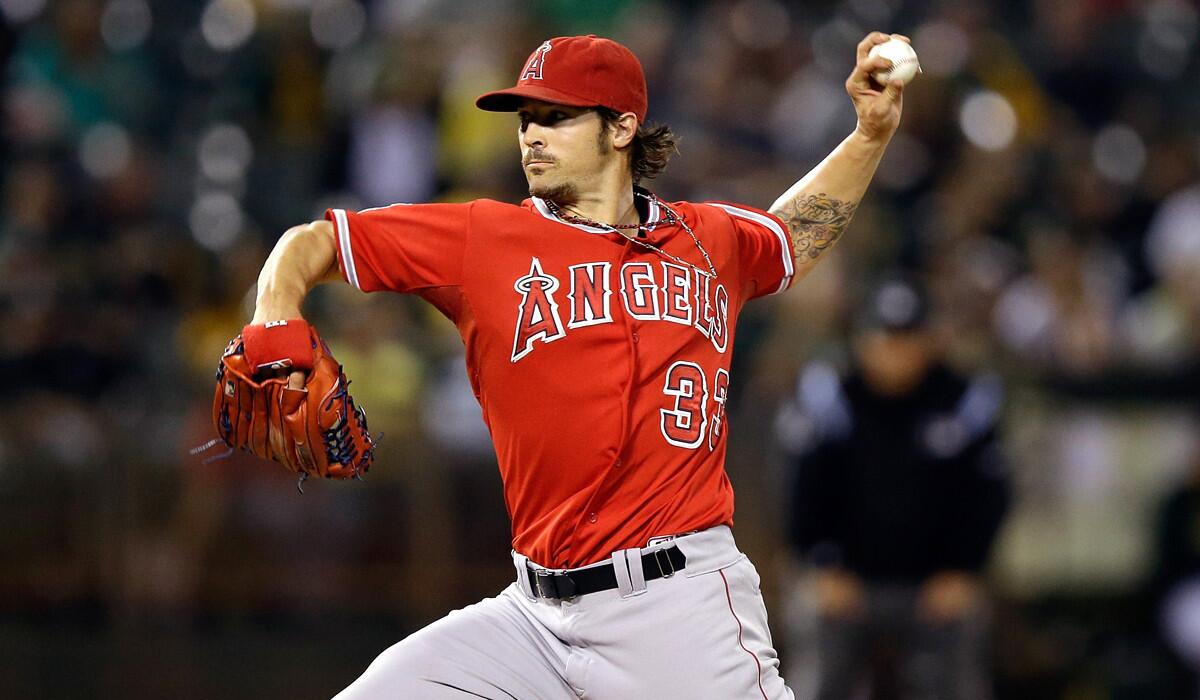 Angels starter C.J. Wilson walked four batters and failed to get out of the first inning against the A's on Monday night in Oakland.