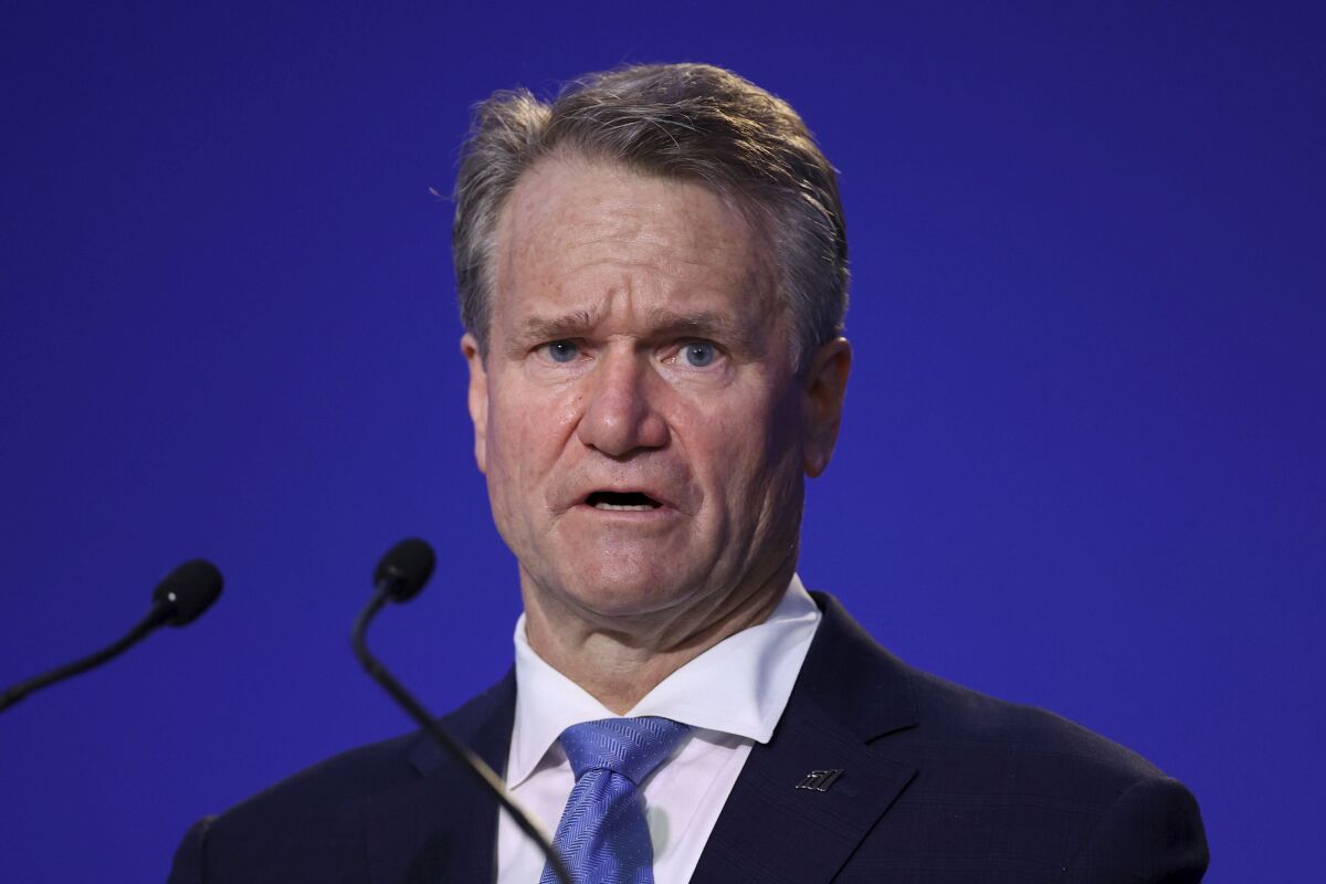 FILE - CEO and Chairman of the Bank of America Brian Moynihan speaks during the UN Climate Change Conference COP26 in Glasgow, Scotland, Nov. 2, 2021. Moynihan said consumers are spending “at a faster rate” than he’s ever seen but he remains concerned as to how inflation and supply-chain issues will influence the economy going into the winter. (Hannah McKay/Pool via AP, File)