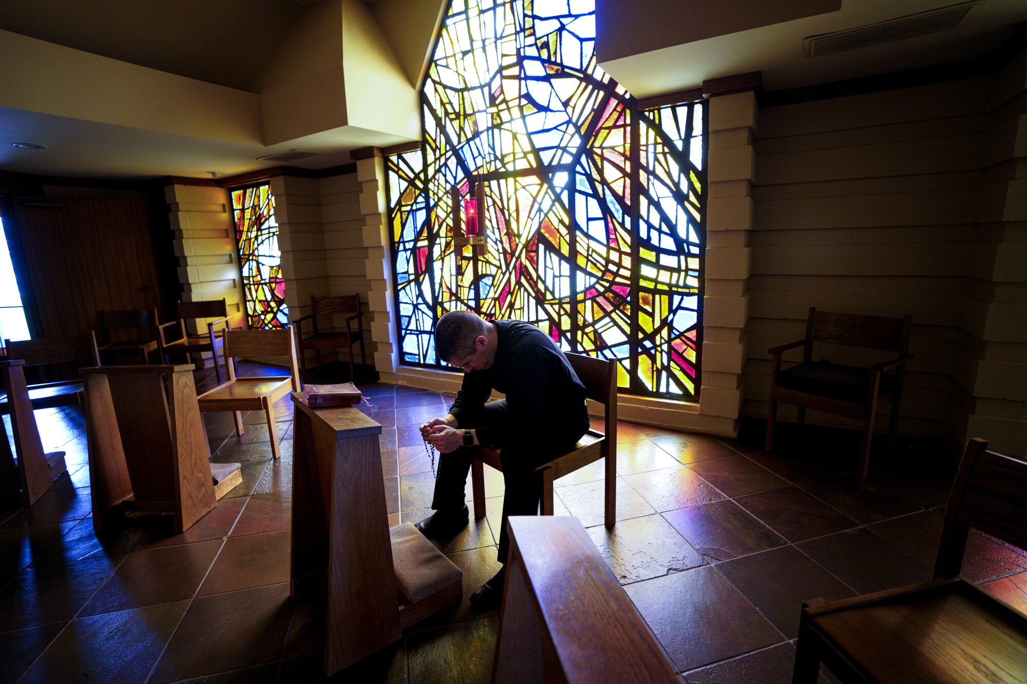 Deacon Daniel Holgren takes a moment for personal prayers 