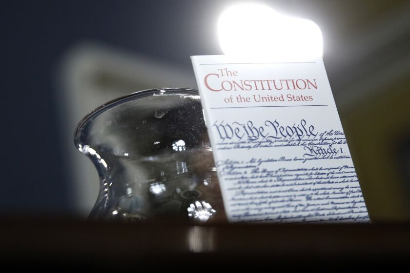 A copy of the U.S. Constitution sits on the desk of Rep. Norma Torres, D-Calif., during a House Rules Committee hearing on the impeachment against President Donald Trump, Tuesday, Dec. 17, 2019, on Capitol Hill in Washington. (AP Photo/Patrick Semansky, Pool)