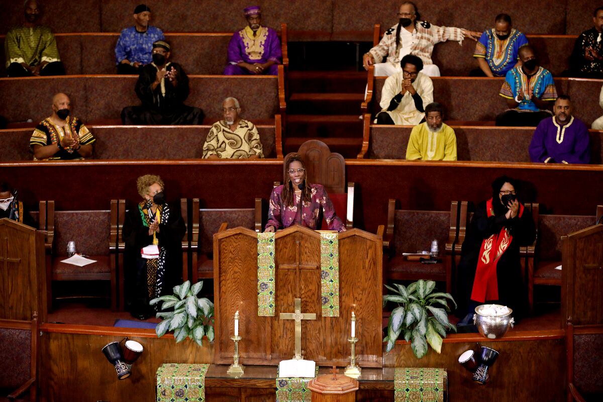 Pastor Thema Bryant delivers a Sunday sermon at First African Methodist Episcopal Church in Los Angeles. 