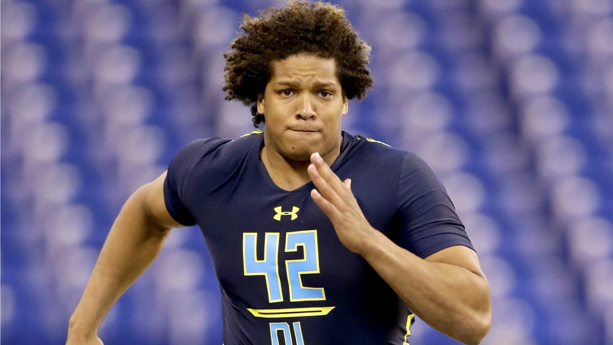 Notre Dame defensive end Isaac Rochell runs the 40-yard dash at the NFL combine in March.