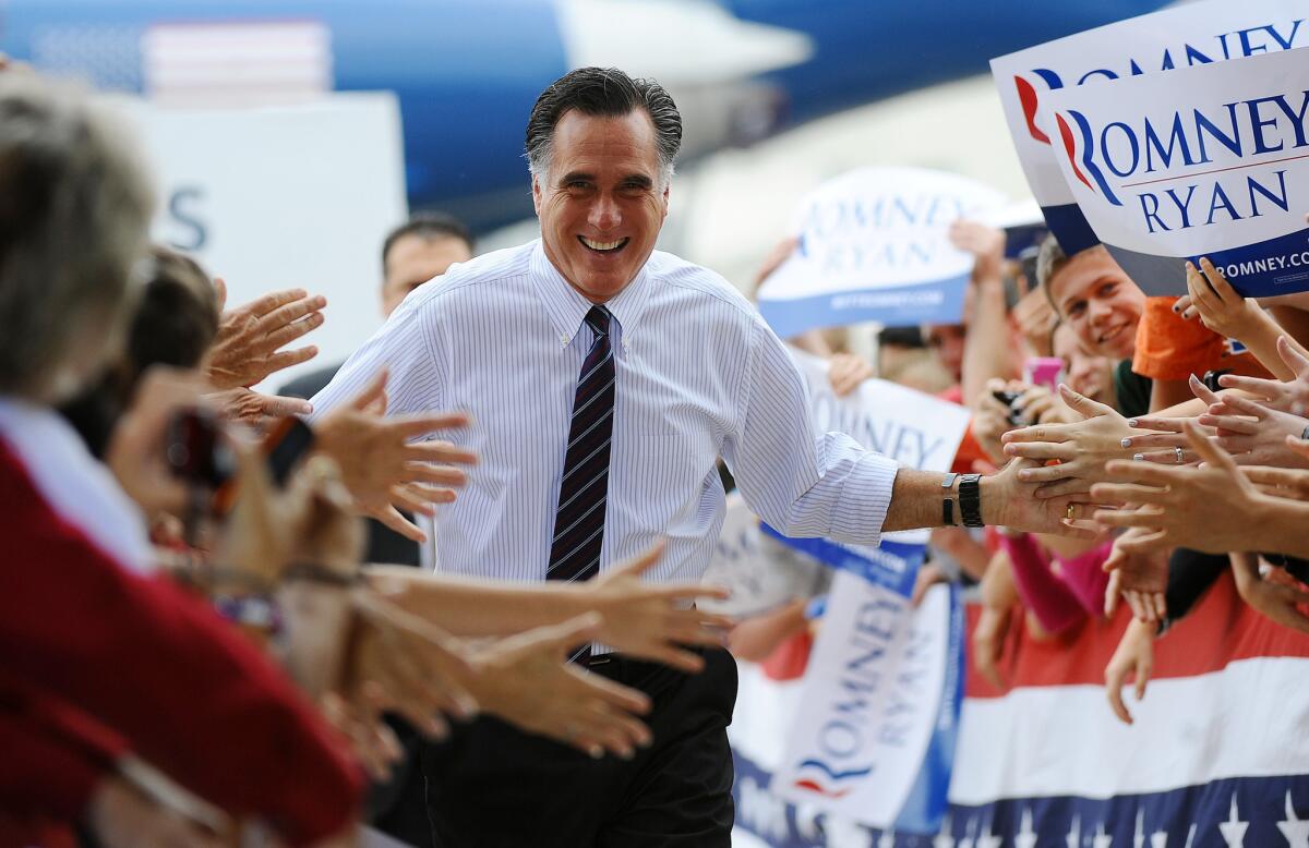 Mitt Romney holds a rally at Orlando Sanford International Airport in Florida.