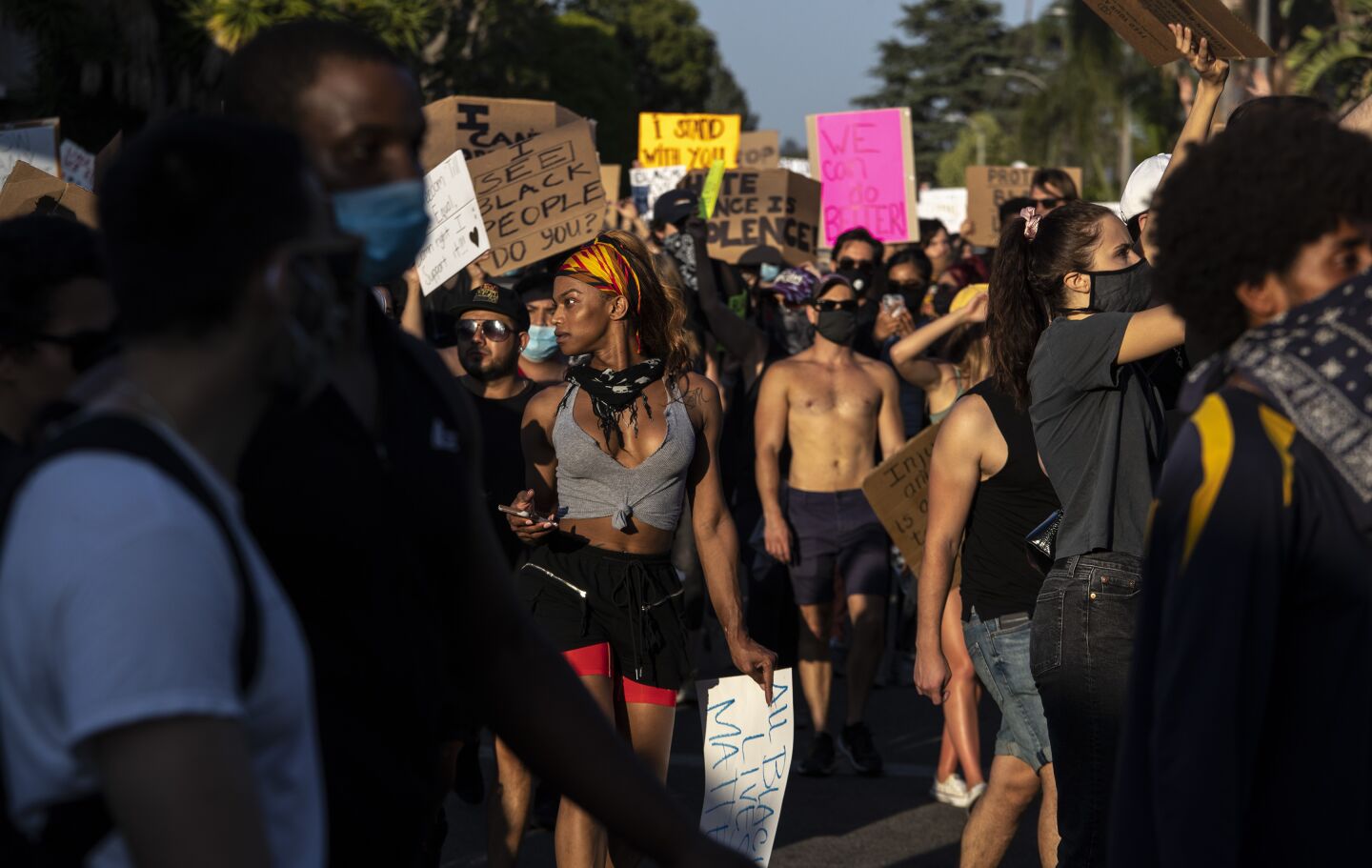 Protesters walk through a residential neighborhood in Hollywood.