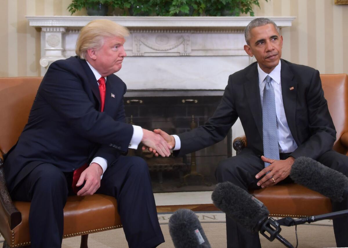 Then-President Obama shakes hands with Donald Trump, then president-elect, at the White House on Nov. 10, 2016.