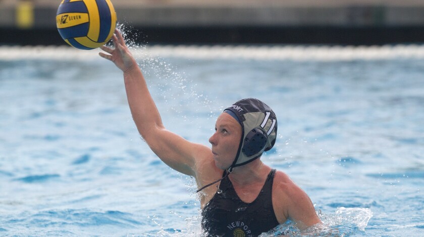 Newport Harbor High girls' water polo alumna Lissa Westerman, shown in action for the Sailors on Dec. 9, 2016, now plays for Hartwick College and is fighting to save the Hawks' program.