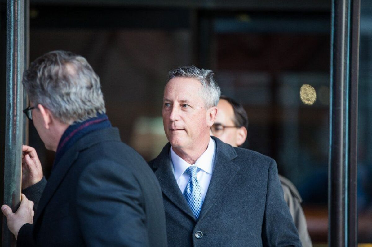 Martin Fox leaves a courtroom in Boston after his arraignment on March 25, 2019.