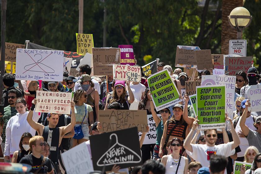 Los Angeles, CA - June 25: Protesters march from Pershing Square to Los Angeles City Hall during one of two abortion rights protests, including a second one that was called the ``Rock for Abortion Rights", and included a concert, rally and march outside the U.S. Federal Courthouse in Los Angeles on Saturday, June 25, 2022. (Allen J. Schaben / Los Angeles Times)