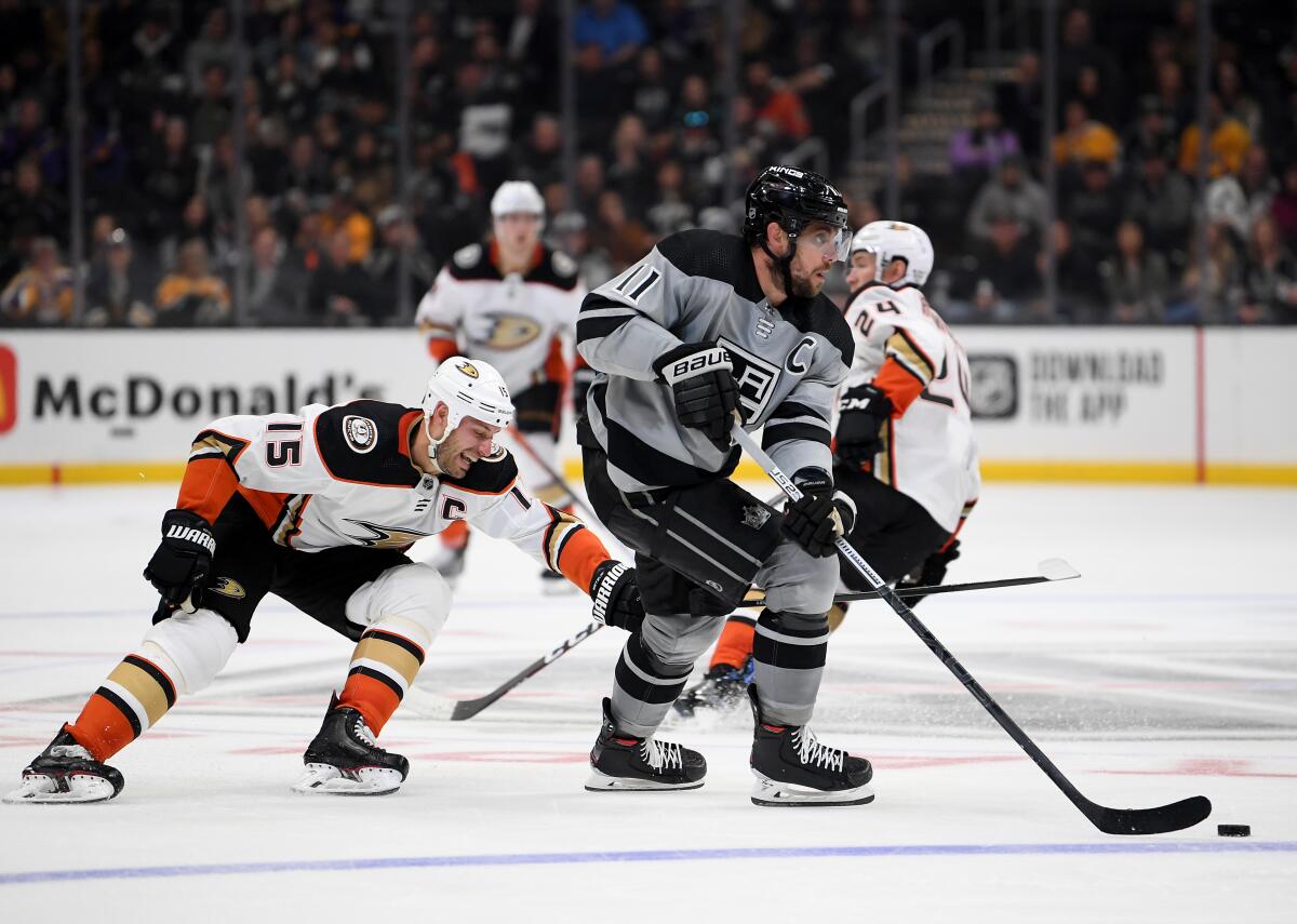 Kings' Anze Kopitar is chased by Ducks' Ryan Getzlaf (15) on Feb. 1 at Staples Center. Both teams' seasons would be over if the NHL jumps straight to the playoffs following the coronavirus shutdown.