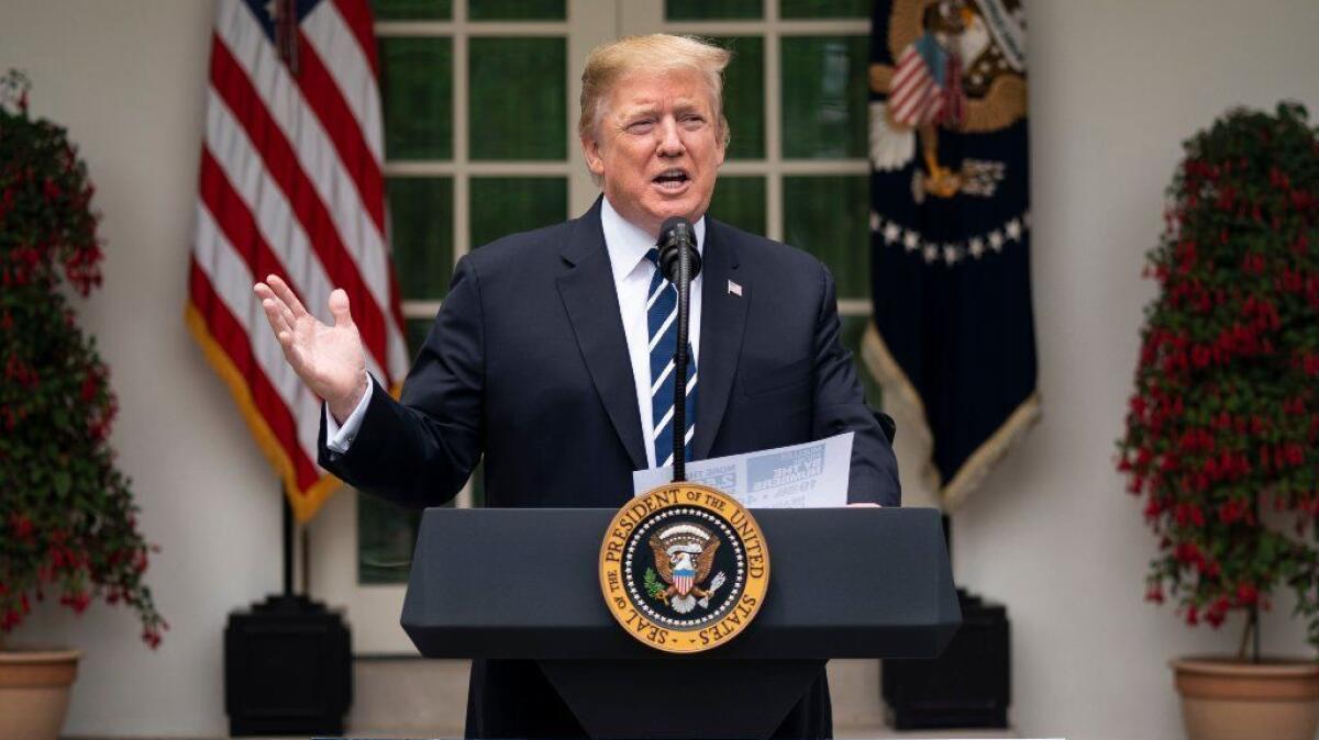 Speaking Wednesday in the White House Rose Garden, President Trump announces he will not negotiate an infrastructure bill with Democratic leaders as long as they are pursuing investigations into him and his administration.