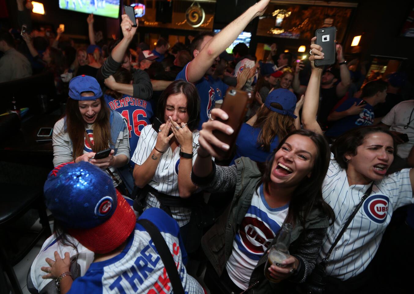 Fans celebrate the Cubs win