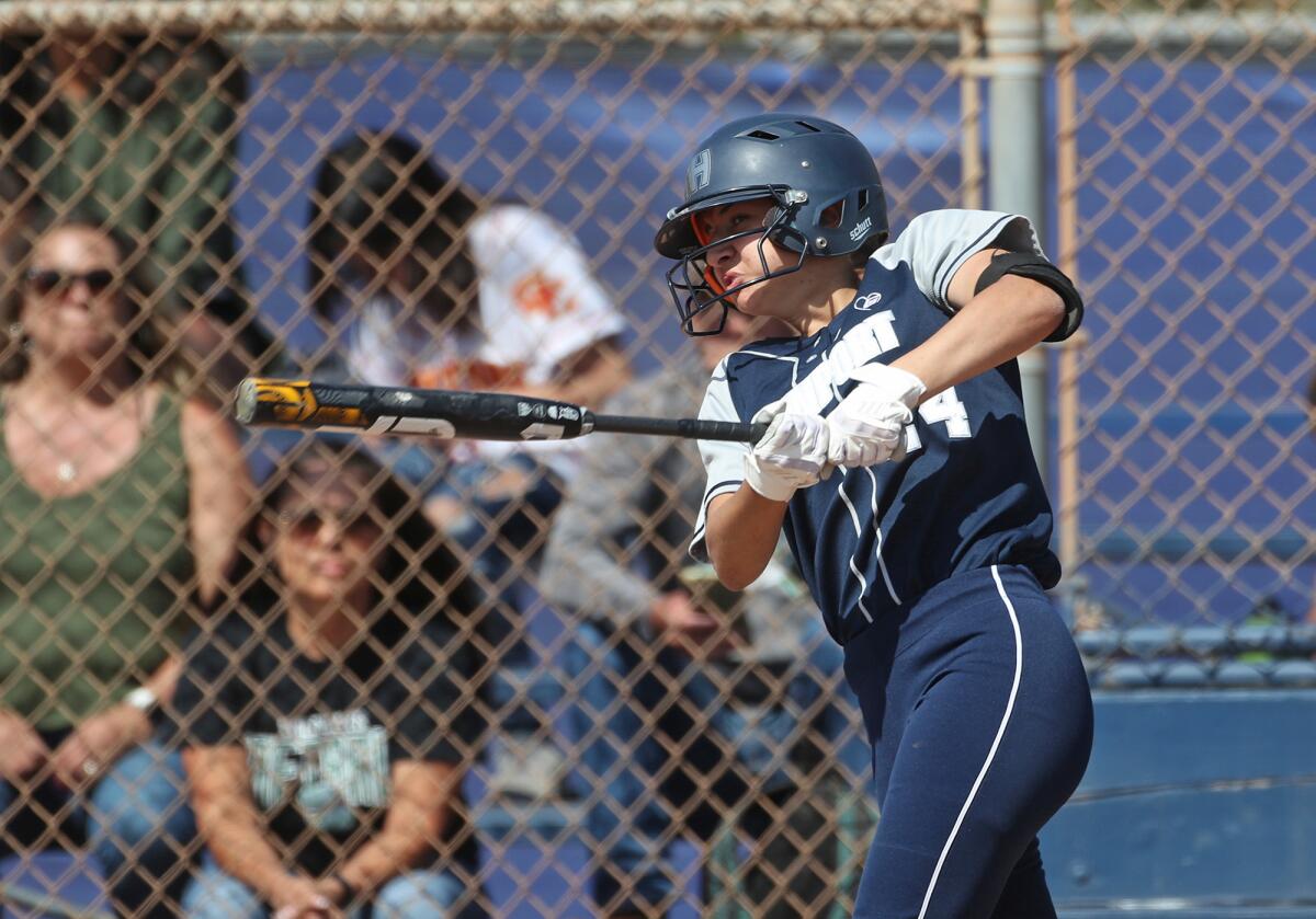 Newport Harbor's Chase Dionio makes contact against Twentynine Palms. Dionio had a triple and a home run in the game.