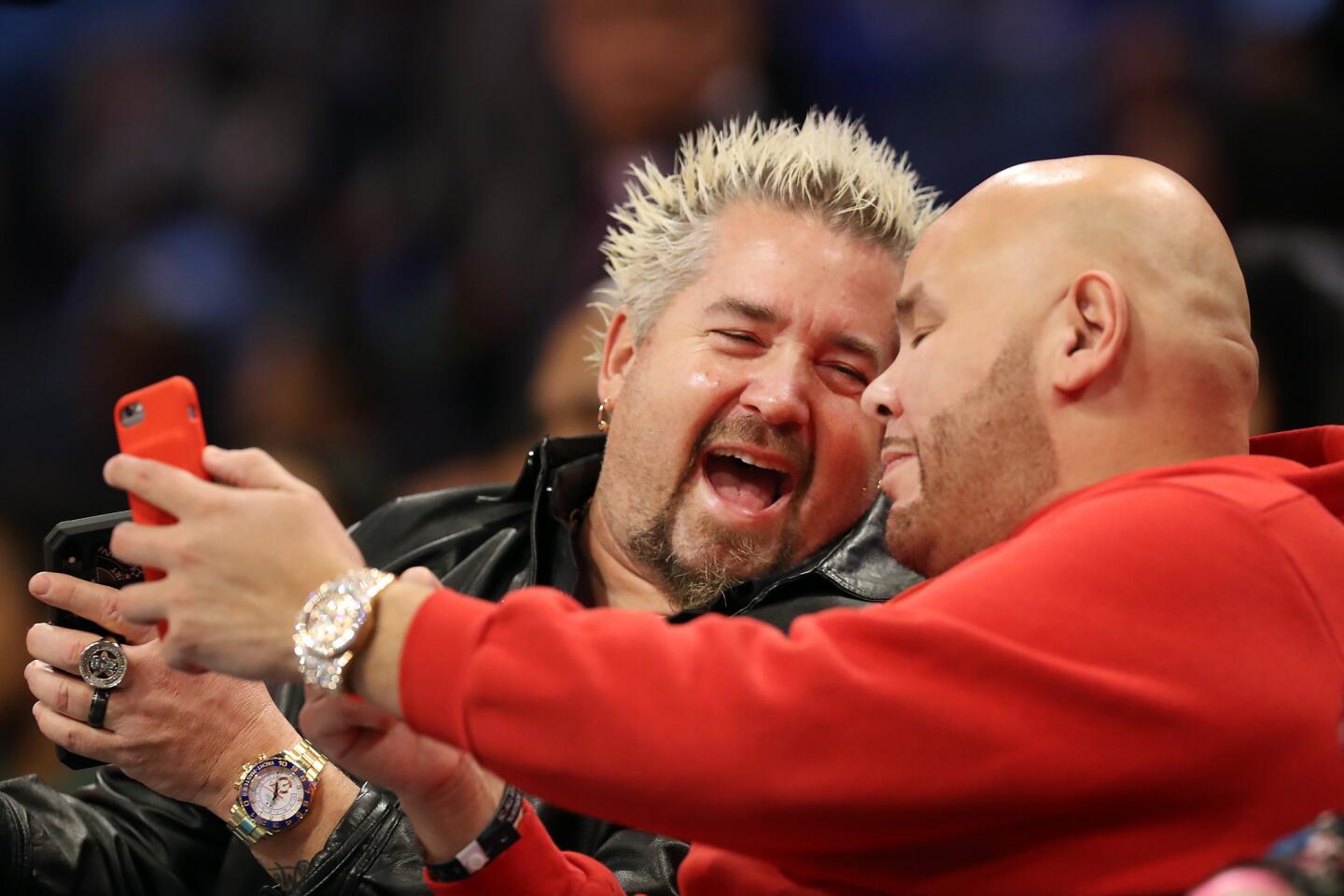 TV personality Guy Fierii and rapper Fat Joe share a laugh during the skills competition.